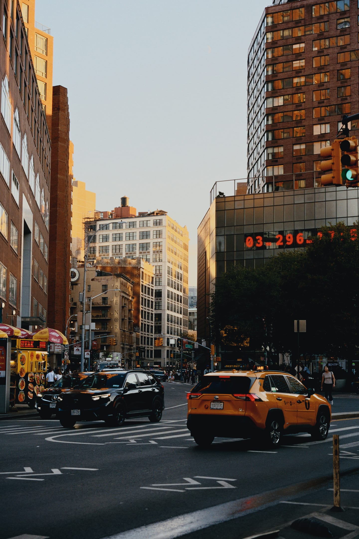 A New York street at golden hour with a yellow cab, developed on Kodak Portra 400 and printed on Kodak Supra Endura.
